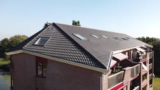 Rénovation de la toiture avec préservation de son aspect unique